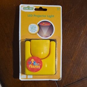 (J54) Sesame Street Friends LED Projector - Bright Yellow